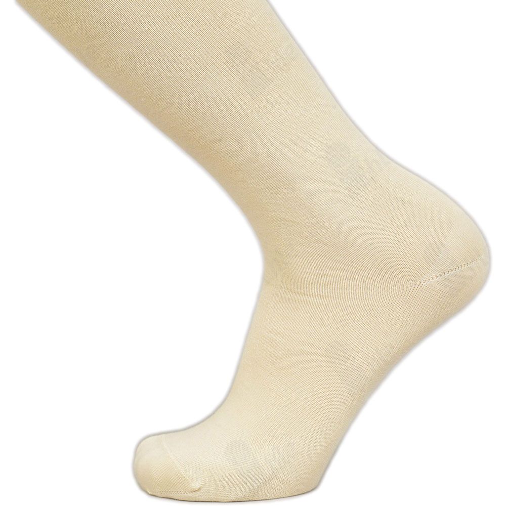 Detailaufnahme eines beigefarbenen Kniestrumpfs. Angora-Material. Fußteil sichtbar.