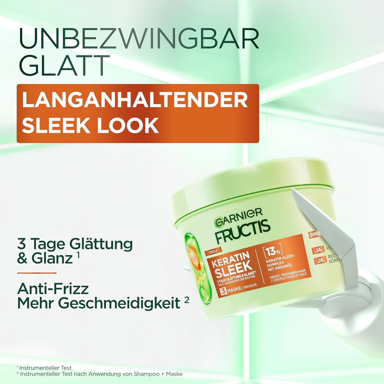 Garnier Fructis Keratin Sleek Haarmaske. Runde, grüne Dose mit Produktinformationen. Text: 3 Tage Glättung & Glanz, Anti-Frizz.