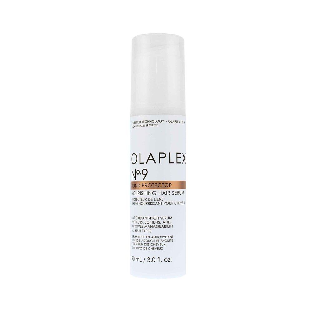 Weißer Olaplex No.9 Bond Protector Flakon mit Pumpe. Aufschrift: Nourishing Hair Serum. Brauner Streifen mit Produktnamen.