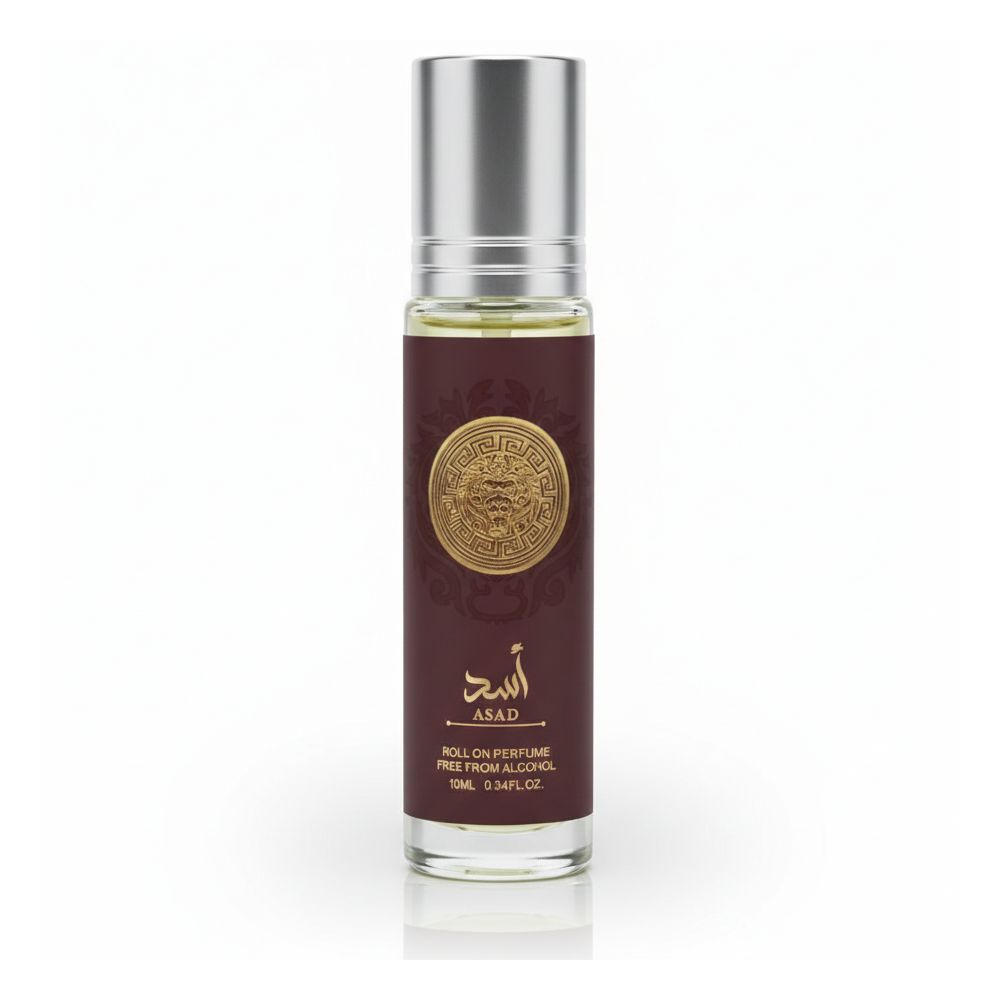 Roll-on-Parfümflasche. Zylindrisch, silberner Deckel. Dunkelrotes Etikett mit goldenem Medaillon und arabischer Schrift.