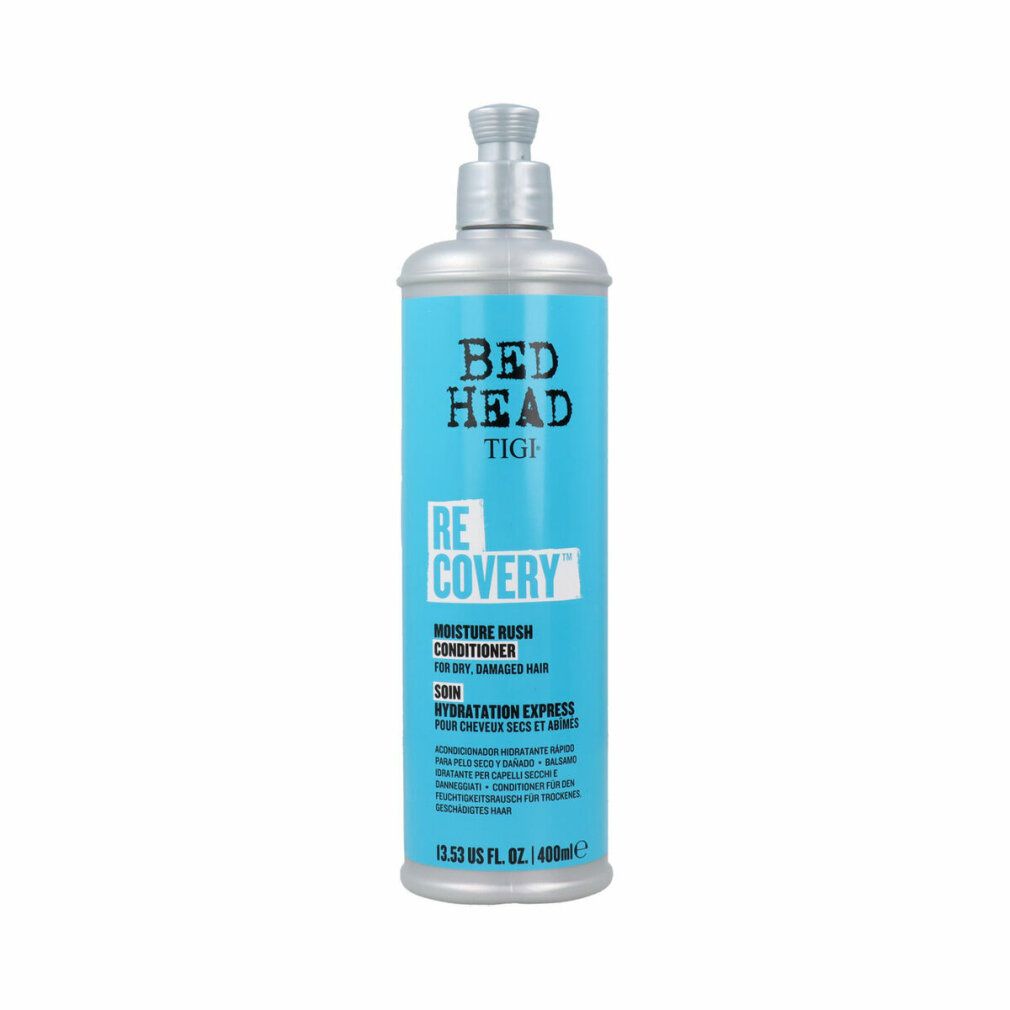 Flasche mit blauem Etikett. Aufschrift: Bed Head, TIGI, Recovery. Feuchtigkeitspflege für trockenes, strapaziertes Haar. 400ml.