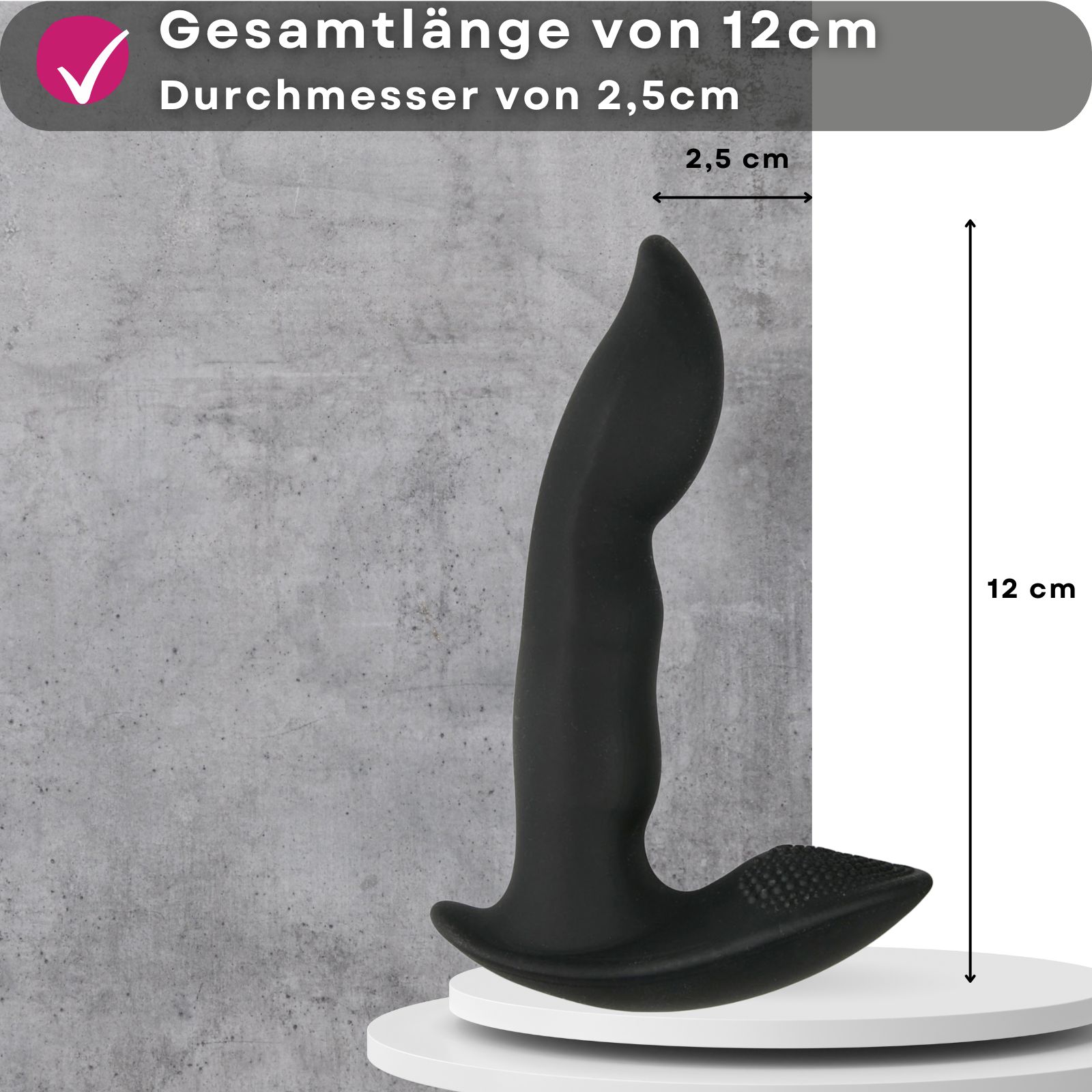 Schwarzes Wellness-Produkt mit Maßangaben: 12 cm Länge, 2,5 cm Durchmesser. Auf weißer Plattform.