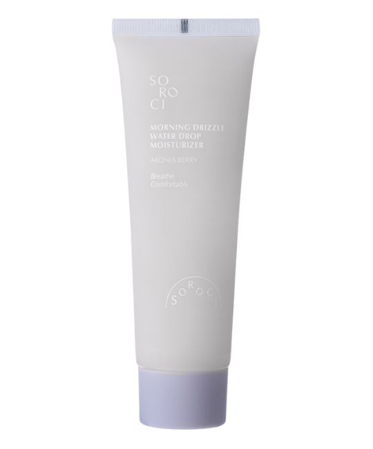 Creme-Tube, hellgrau, mit Aufschrift. Produktname: Morning Drizzle Waterdrop Moisturizer. Marke: Soroci. Fliederfarbener Deckel.