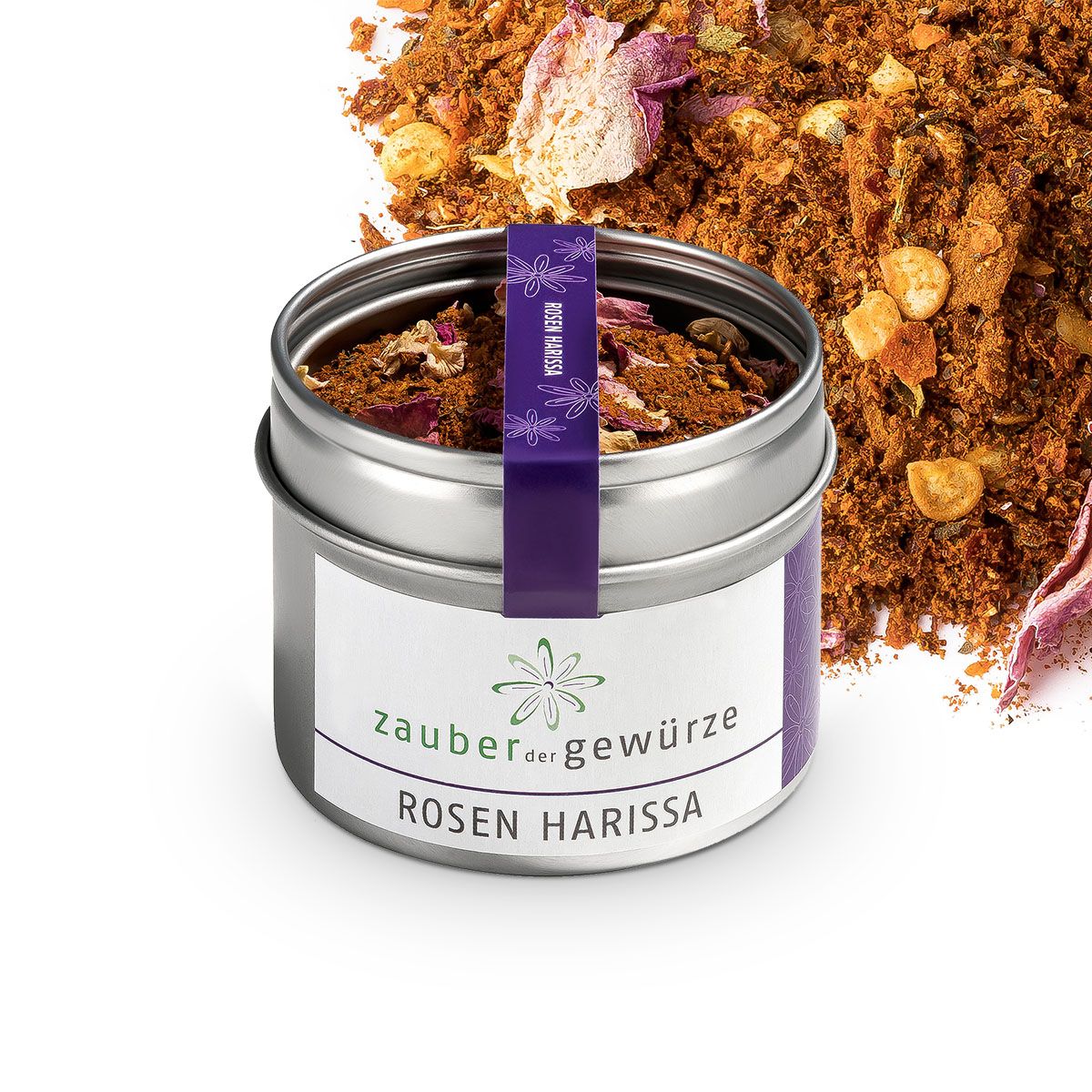 Metallbehälter mit Zauber der Gewürze Rosen Harissa. Etikett mit Produktname und Logo. Lila Band mit Produktname.
