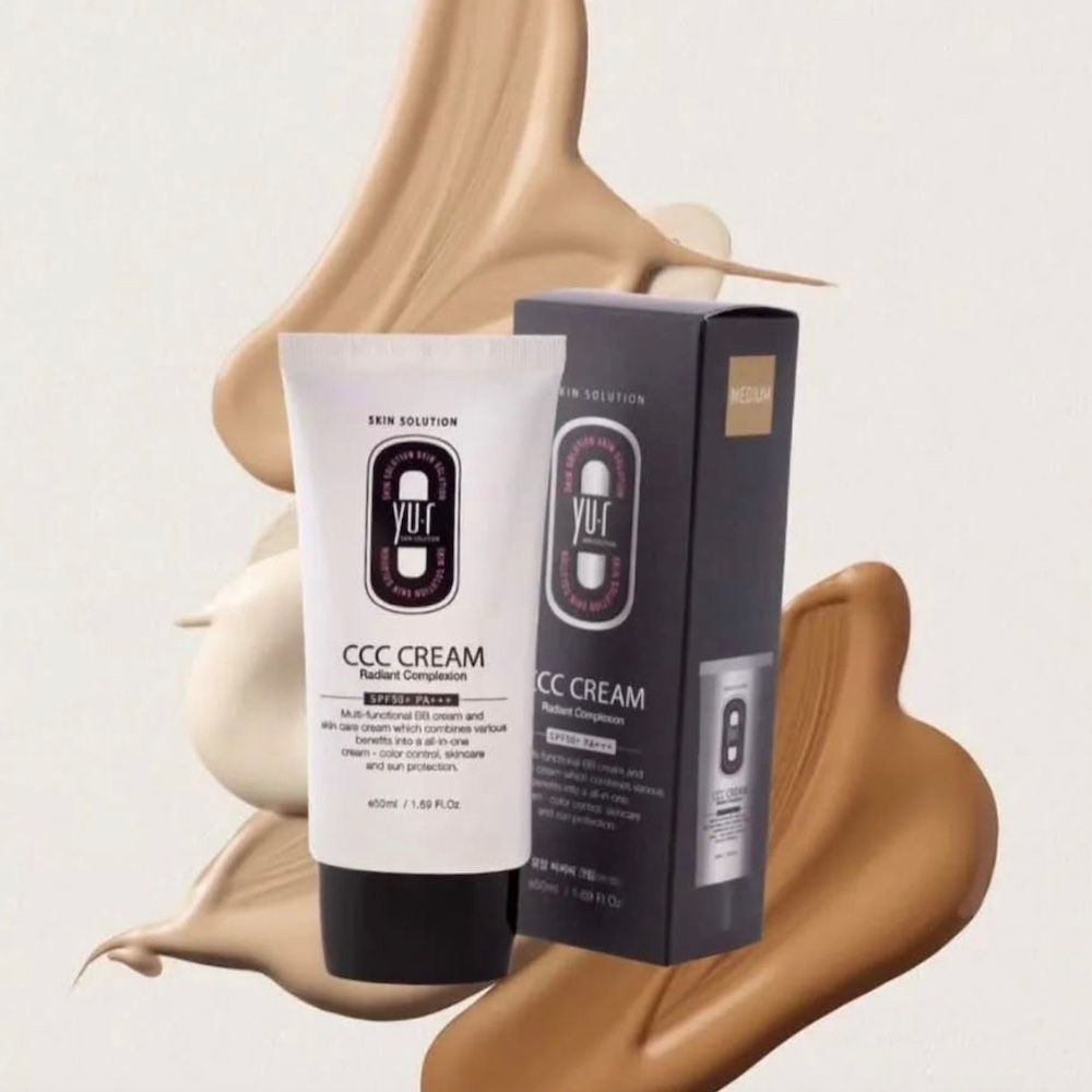 Yu.r CCC Cream Tube und Verpackung. Farbkleckse im Hintergrund. Schwarze Schrift. 50ml/1.69 FL.OZ.