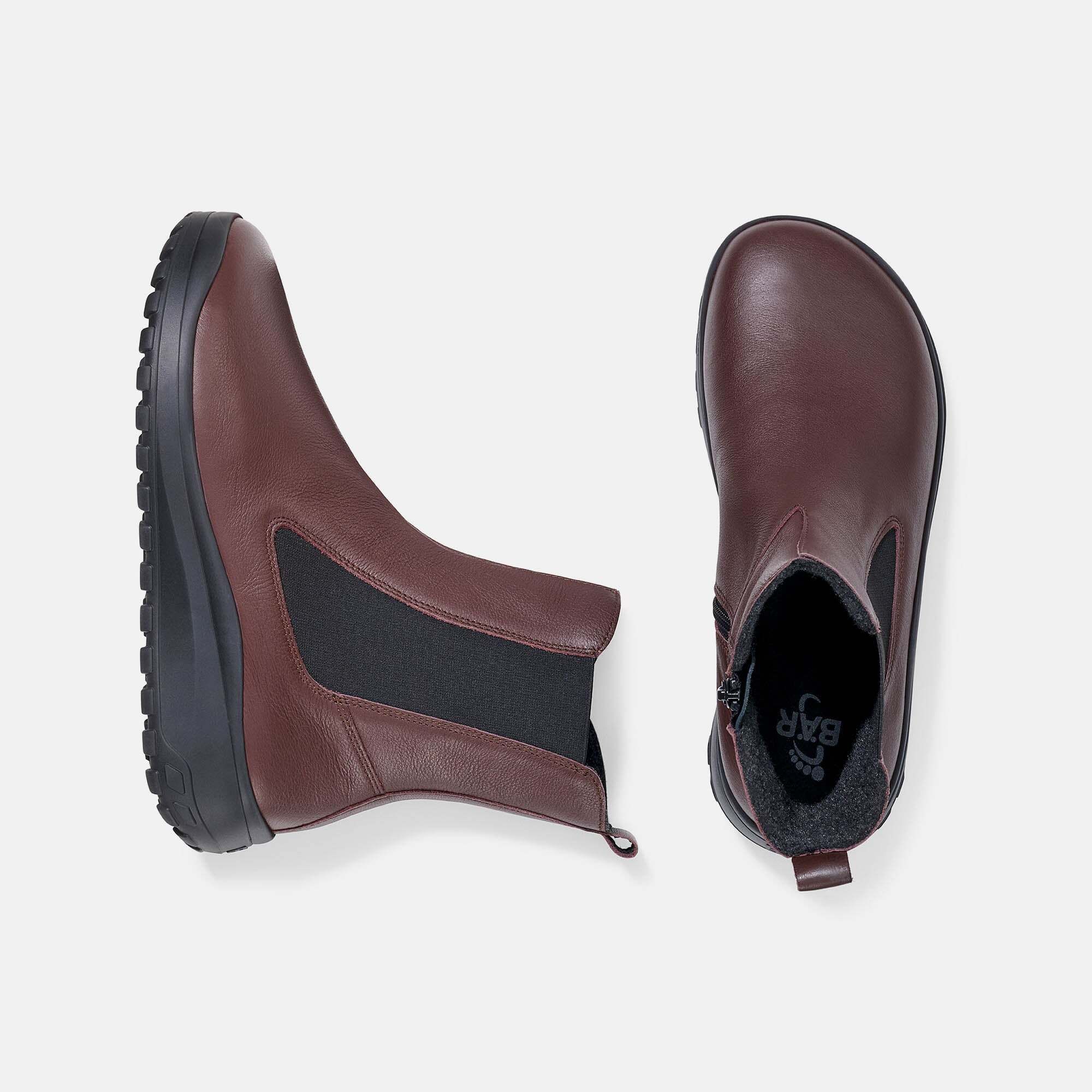 Oberansicht von dunkelbraunen Leder-Stiefeletten mit seitlichem Reißverschluss und Innenfutter.
