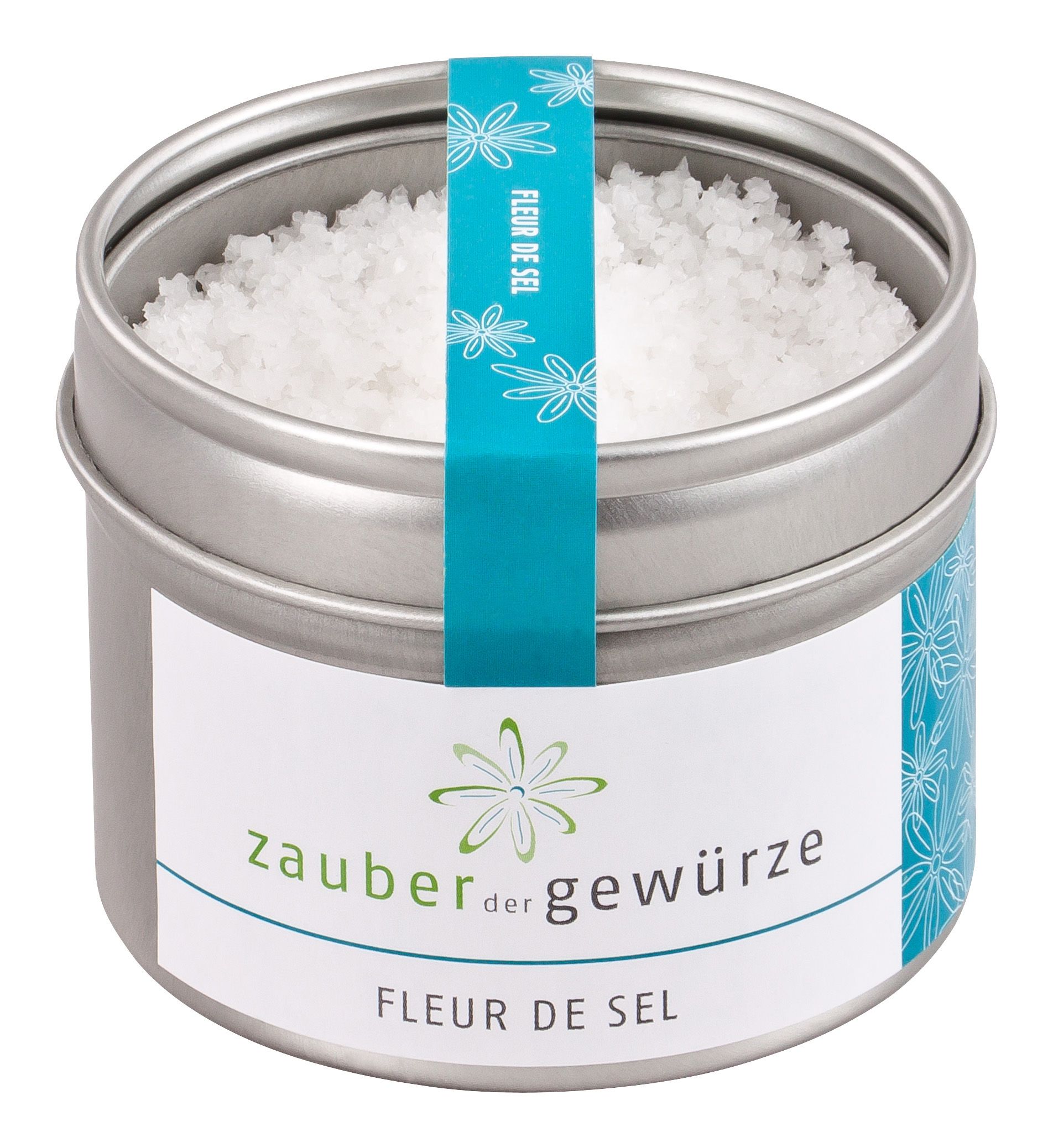 Runde Dose mit Fleur de Sel. Aufschrift: Zauber der Gewürze, Fleur de Sel. Türkisfarbenes Band mit Blumenmuster.