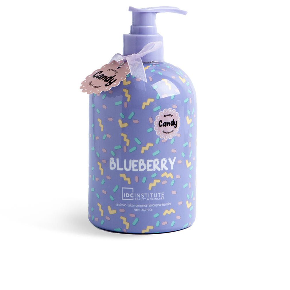 Flasche mit Pumpverschluss. Lila mit bunten Streuseln. Aufschrift "Candy Blueberry". Anhänger mit "Candy". Marke: IDC INSTITUTE.