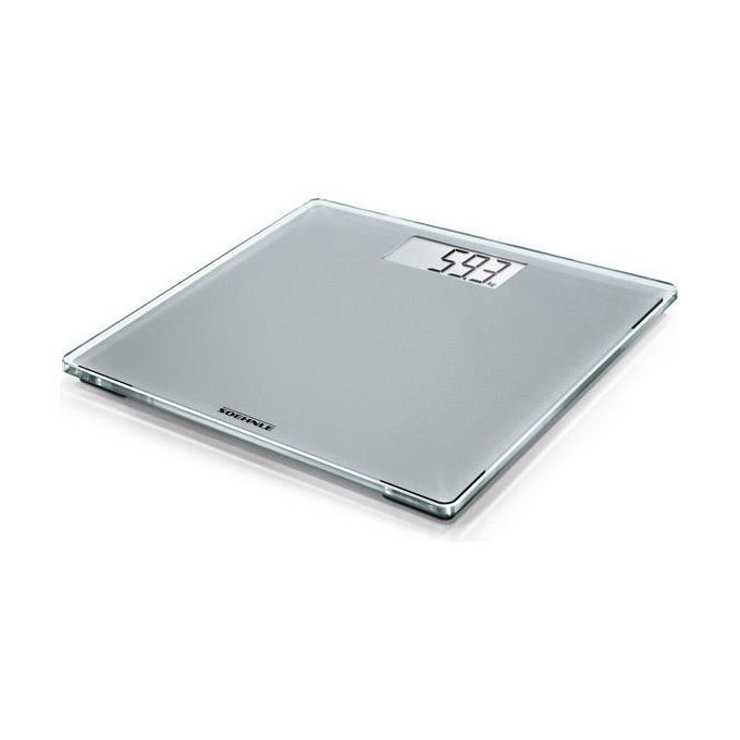 Personenwaage mit digitaler Anzeige. Glasoberfläche, silberfarben. Anzeige: 59.3.