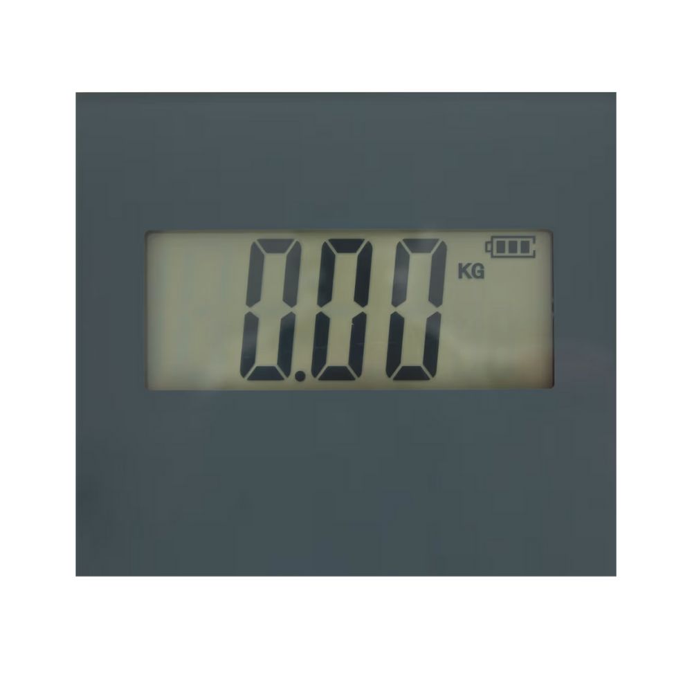 Nahaufnahme der digitalen Anzeige einer Waage. Zeigt '0.00 KG' und ein Batteriesymbol.