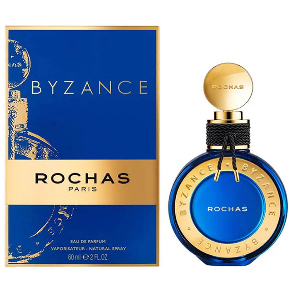 Blau-goldene Verpackung und runde blaue Flasche. Auf der Verpackung steht BYZANCE und ROCHAS PARIS. Flasche mit goldenem Deckel.