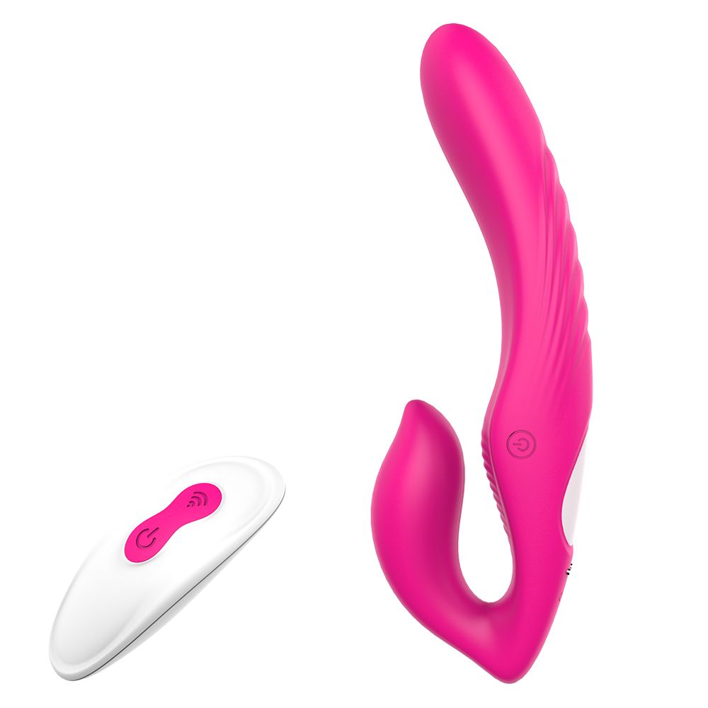 Pinkfarbener Vibrator und weiße Fernbedienung. Beide Geräte sind nebeneinander angeordnet.
