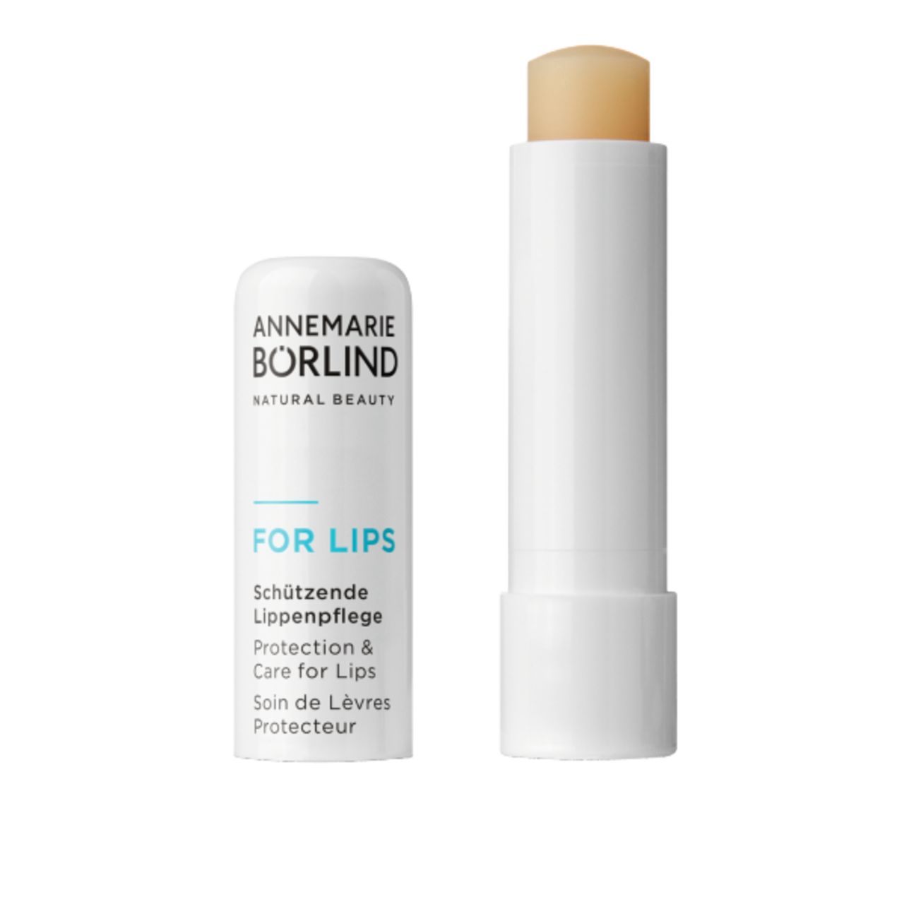 Lippenpflegestift, weiß. Geöffnet, Stift sichtbar. Marke: ANNEMARIE BÖRLIND FOR LIPS.