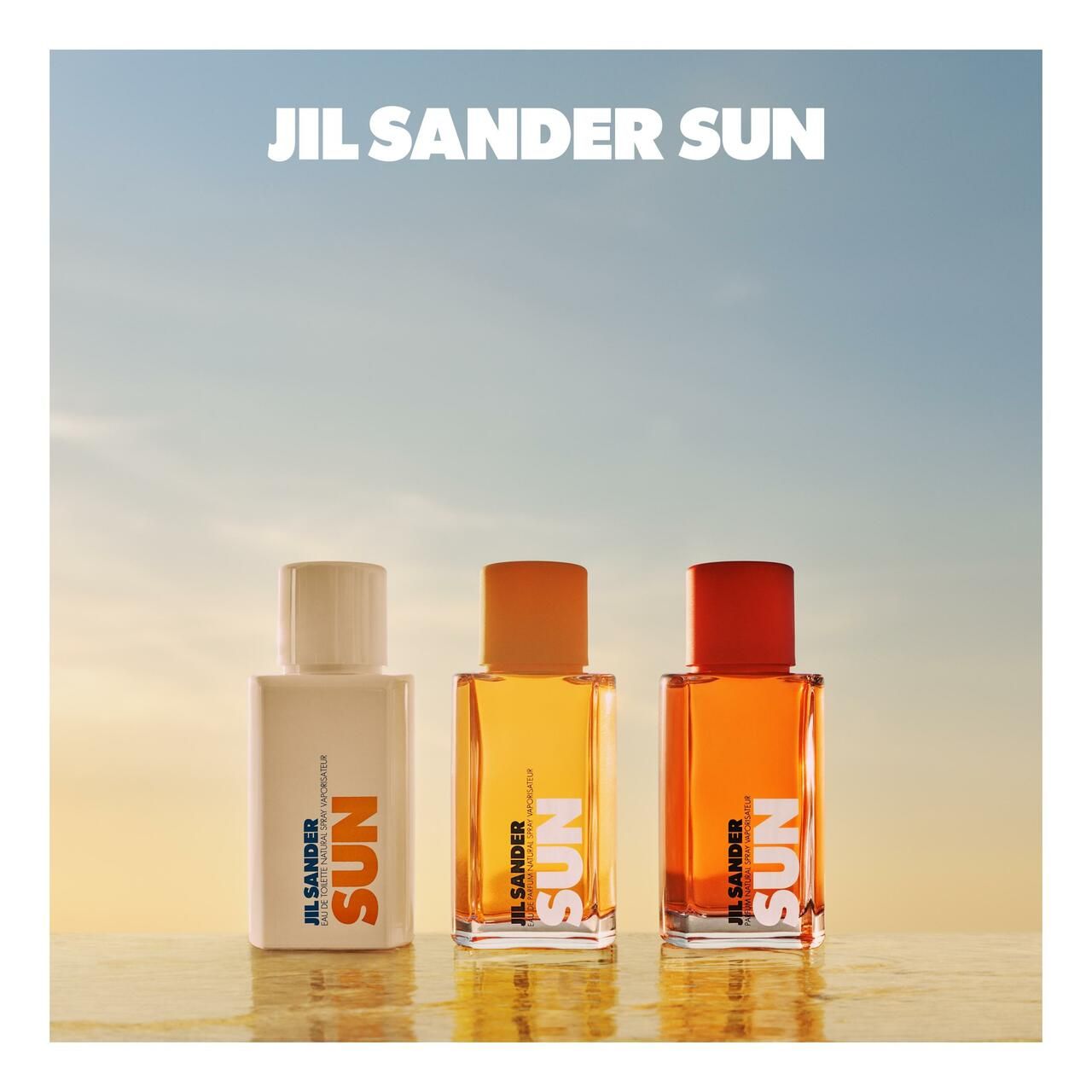 Weißer Flakon mit weißem Deckel. Aufschrift SUN in Orange. JIL SANDER-Logo und Text.