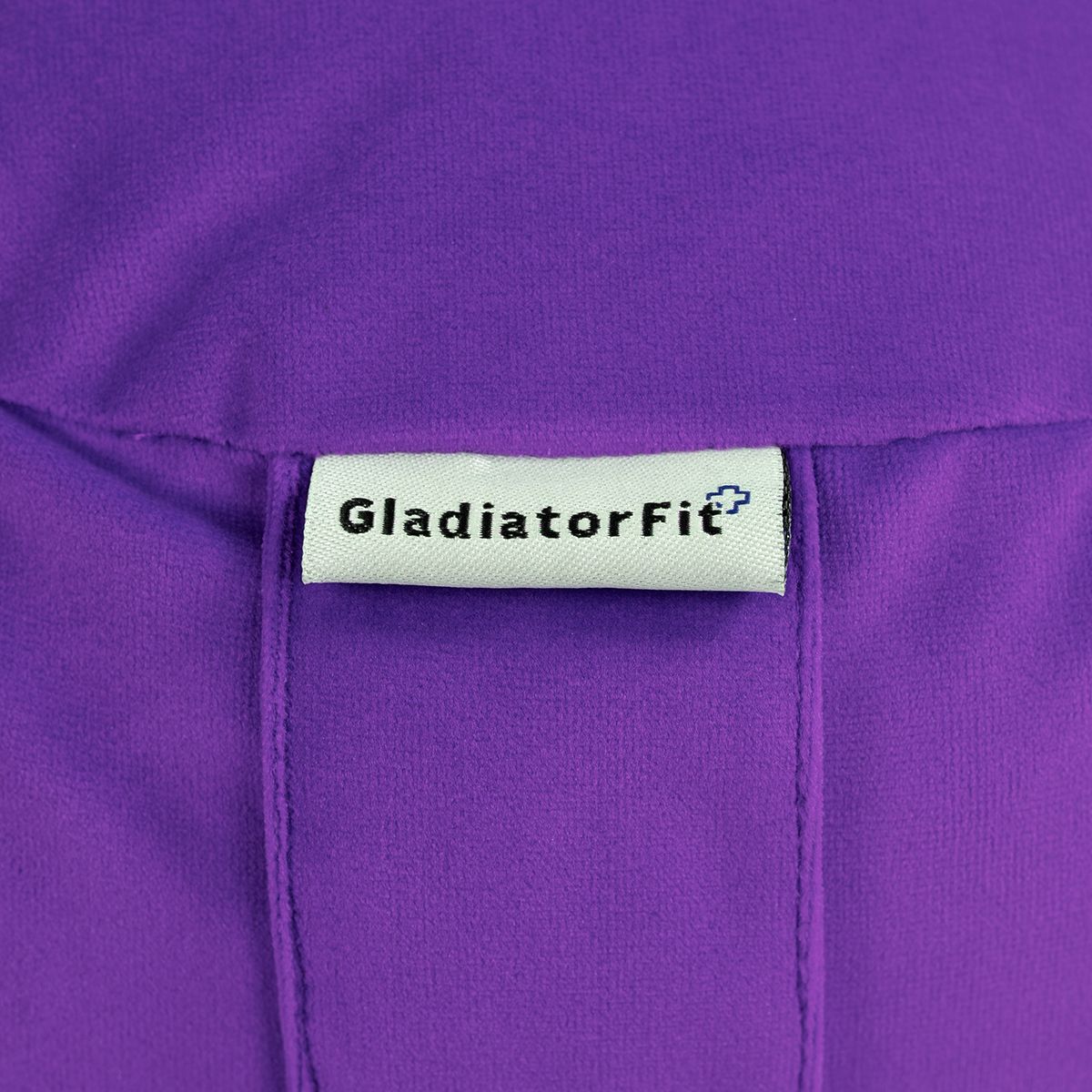 Nahaufnahme des violetten Kissens mit Label "GladiatorFit".
