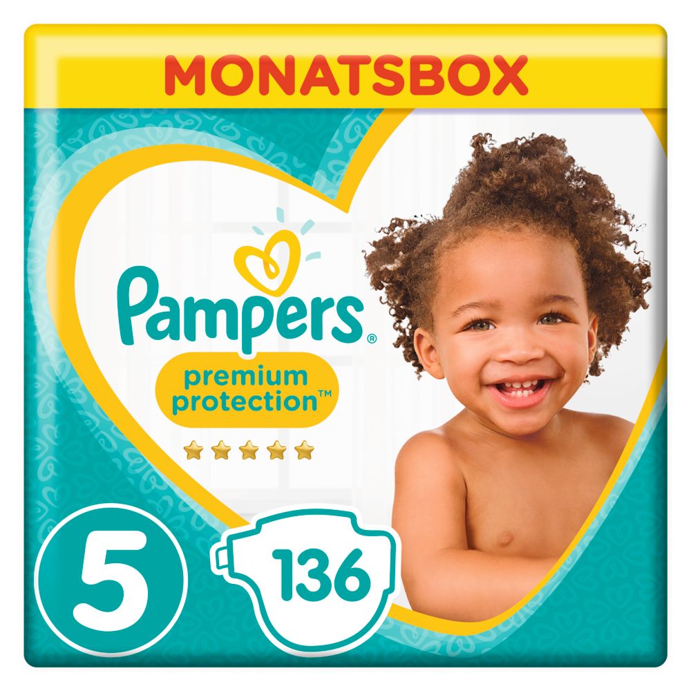 Pampers MonatsBox, Gr. 5, mit Baby. Verpackung mit Logo, Schriftzug und Sterne. Aufdruck: Premium Protection, 136 Stück.
