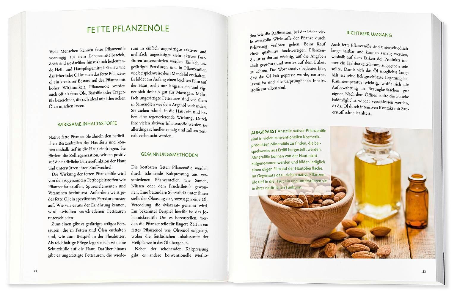 Buchseite mit Text, Mandeln, Ölflaschen und Schüssel. Thema: Fette Pflanzenöle.