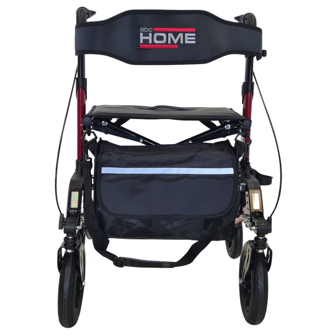 Roter abc HOME Rollator, Vorderansicht mit Tasche.