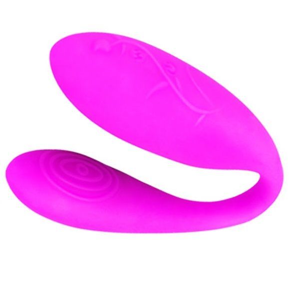 U-förmiges Produkt, pinkfarben, mit geriffelter Oberfläche an einem Ende und dekorativen Elementen.