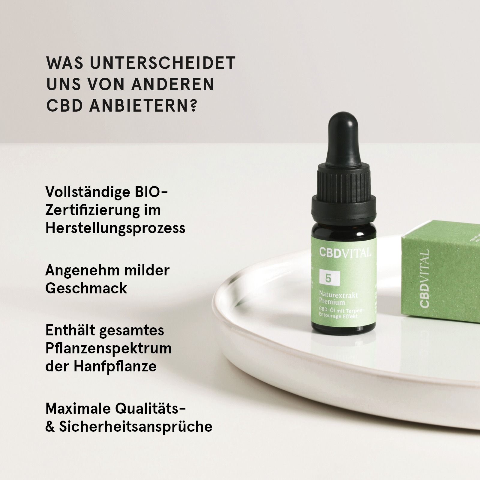 Flasche CBD VITAL Bio CBD 10% Naturextrakt Premium Hanföl auf einem Teller. Text über Alleinstellungsmerkmale.