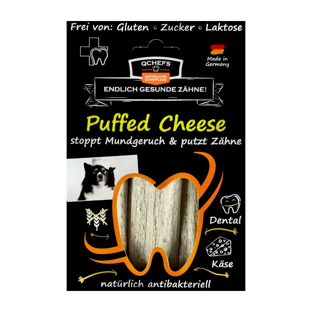 Verpackung von QCHEFS Puffed Cheese. Schwarzer Hintergrund, Produktabbildung, Text: Puffed Cheese, stoppt Mundgeruch & putzt Zähne.