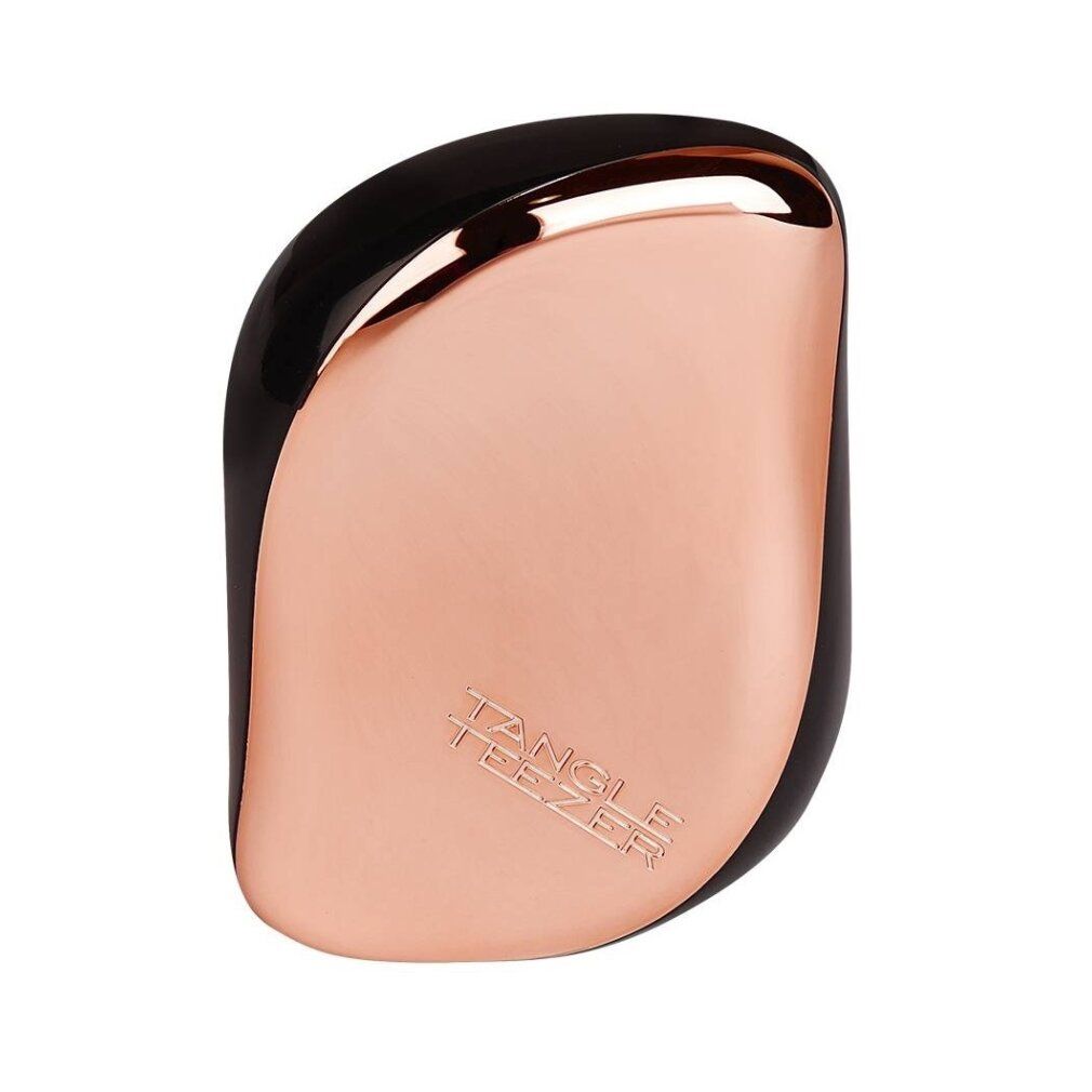 Kompakte Haarbürste, schwarz und kupferfarben. Geprägt: Tangle Teezer.