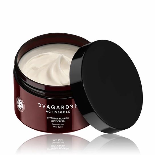 Offene, braune Creme-Dose mit schwarzem Deckel. Aufschrift: Eva Garden Active Gold Intensive Nourish Body Cream. Creme sichtbar.