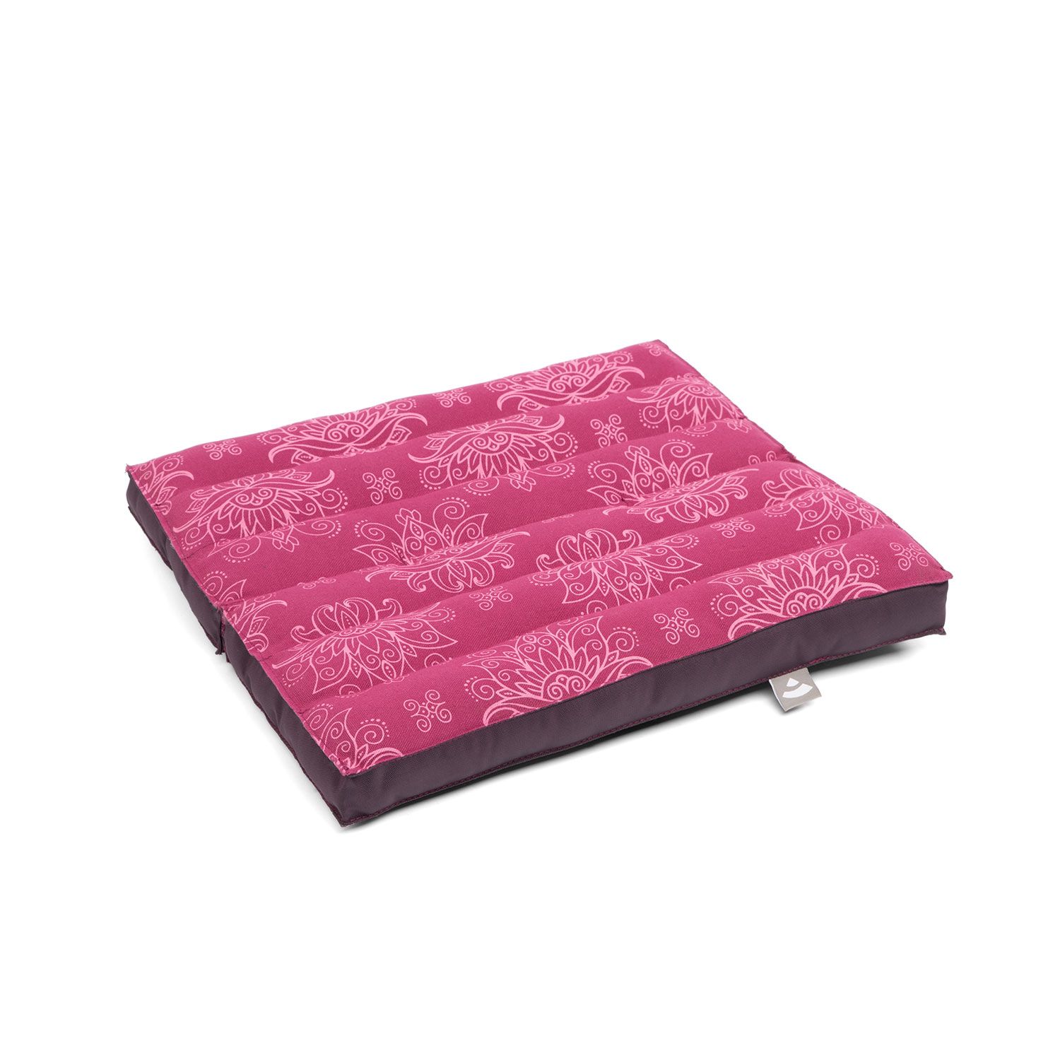 Meditationskissen, berry, mit floralem Muster. Dunkelroter Rand. Mit Logo-Etikett.