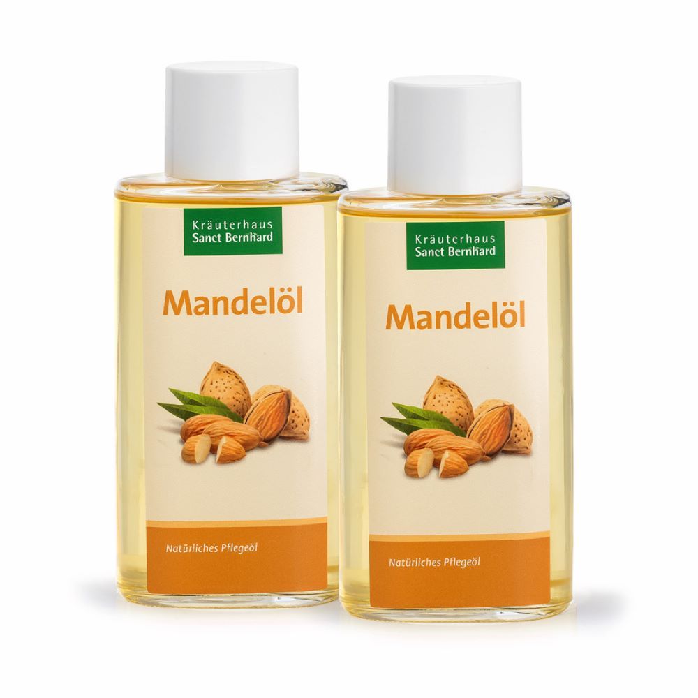 Zwei Flaschen mit Mandelöl. Etikett mit Produktname und Abbildung von Mandeln. Marke: Kräuterhaus Sanct Bernhard.