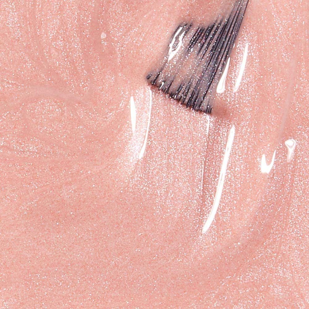 Nagellack-Applikator in rosa Lack. Pinsel mit Lack benetzt. Nahaufnahme.