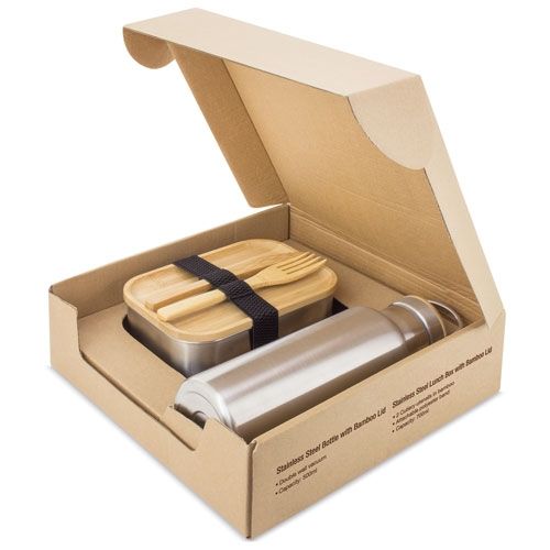 Verpackung mit Edelstahl-Trinkflasche und Brotdose mit Bambusdeckel. Enthält Besteck. Braune Kartonverpackung.