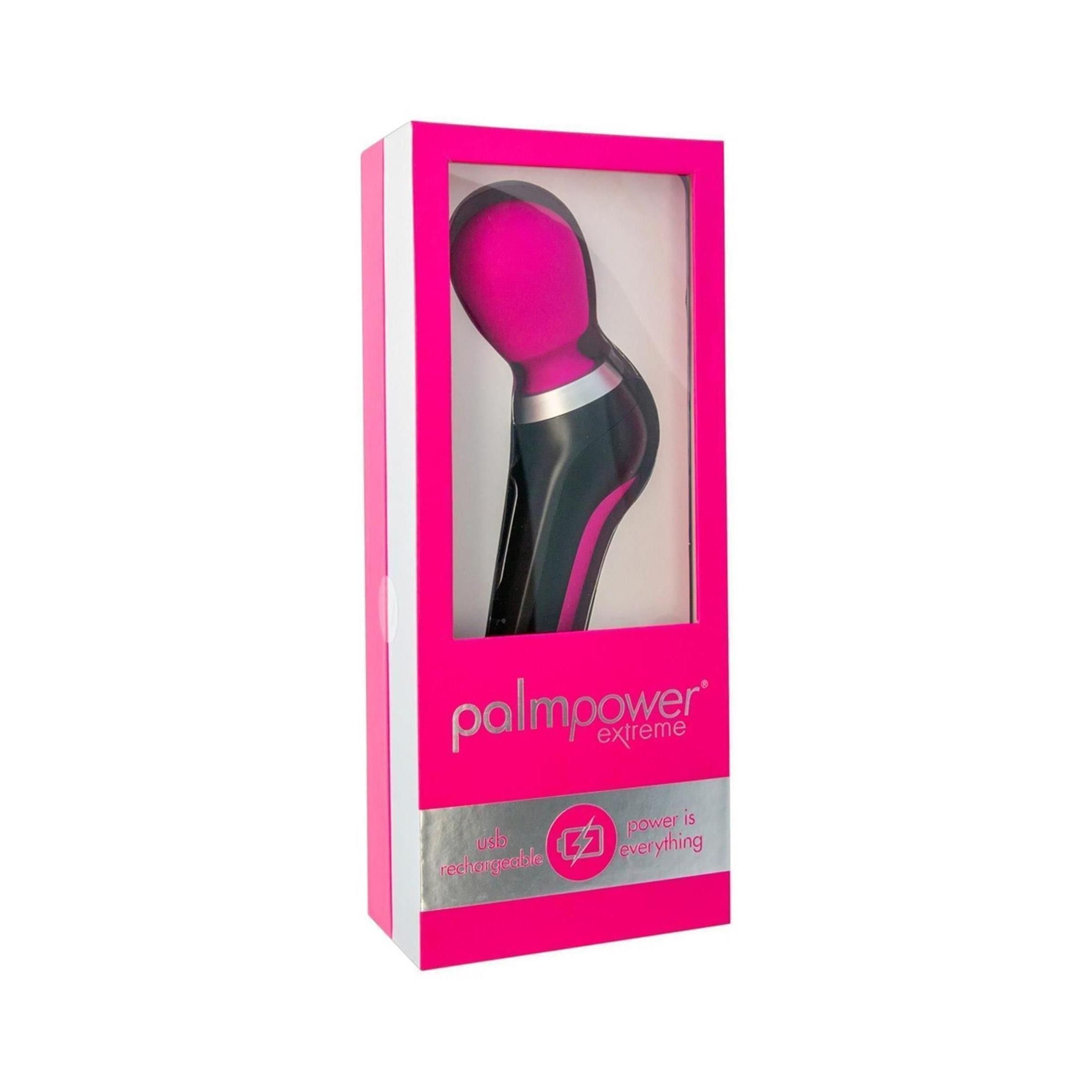 Verpackung mit Massagegerät. Pinkfarbene Box mit Produktbild und Text: "Palmpower extreme".
