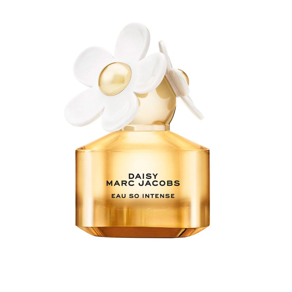 Parfümflasche mit weißer Blüte auf dem Deckel. Goldfarbenes Glas mit Aufschrift.