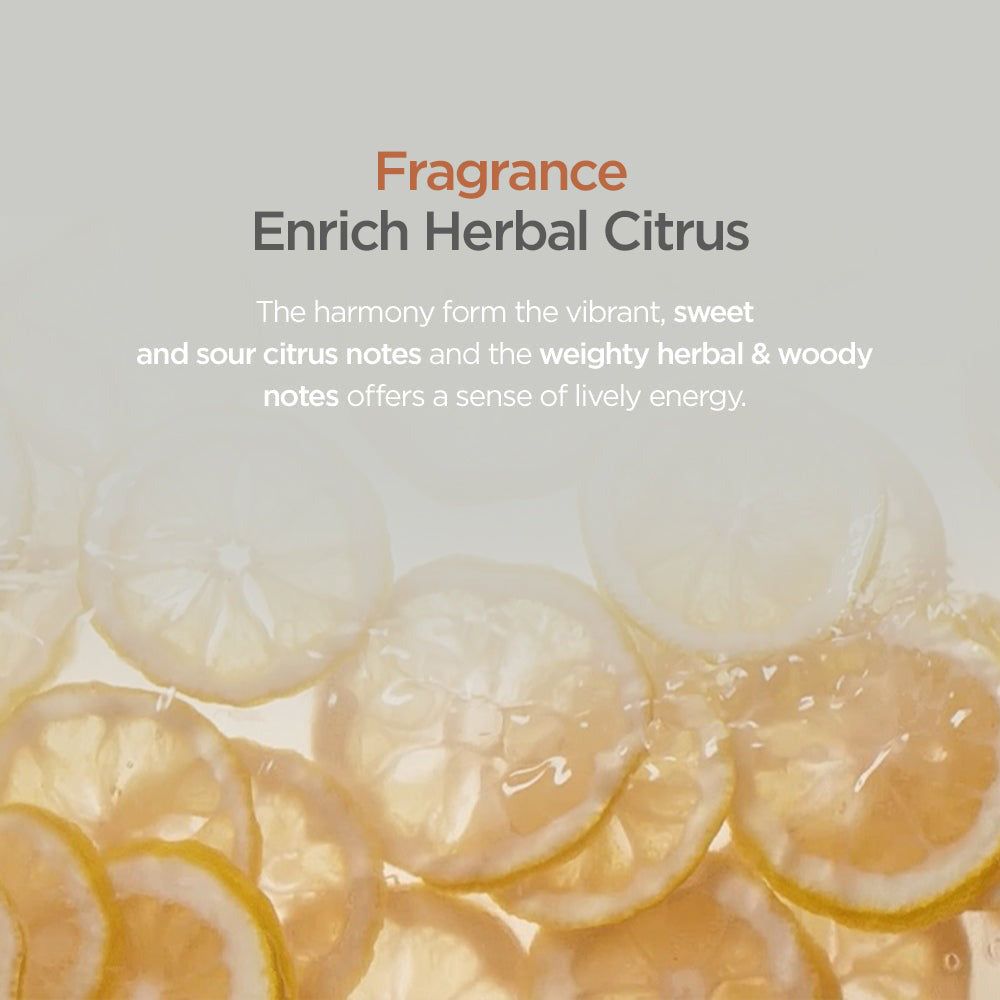 Scheiben von Zitrusfrüchten mit Spritzern, die den Duft 'Enrich Herbal Citrus' von AYUNCHE darstellen.