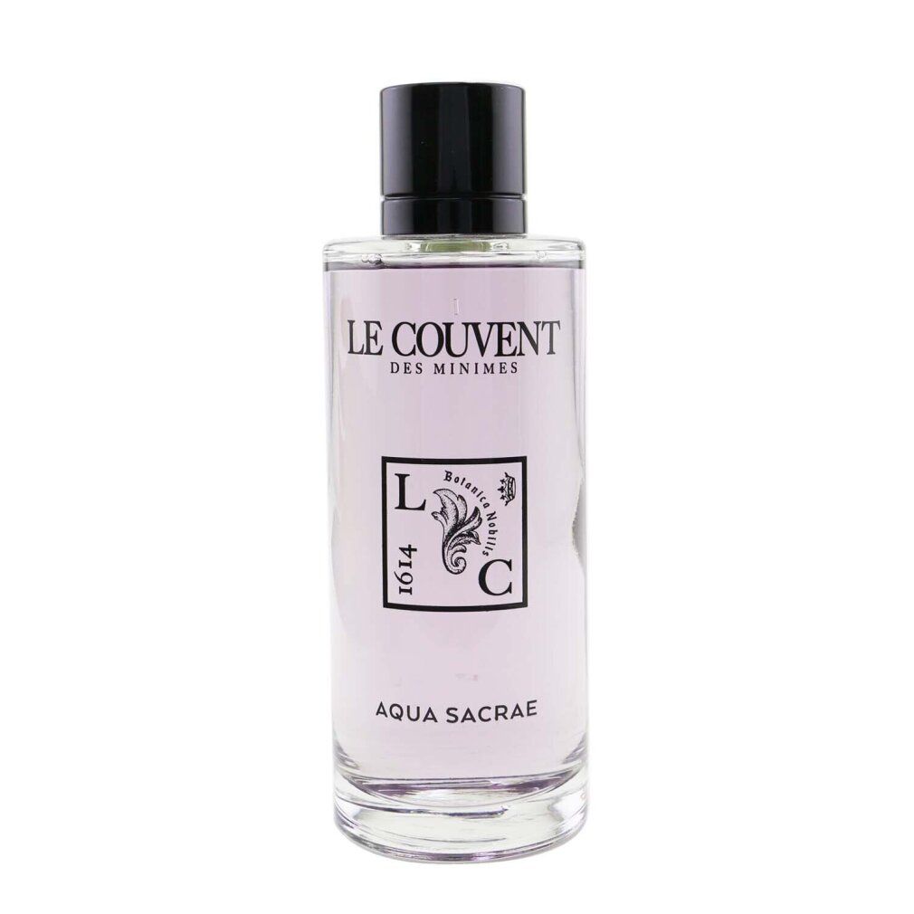 Glasflakon mit schwarzem Verschluss. Aufschrift: Le Couvent, Aqua Sacrae. Logo mit floralen Elementen und Schriftzug.