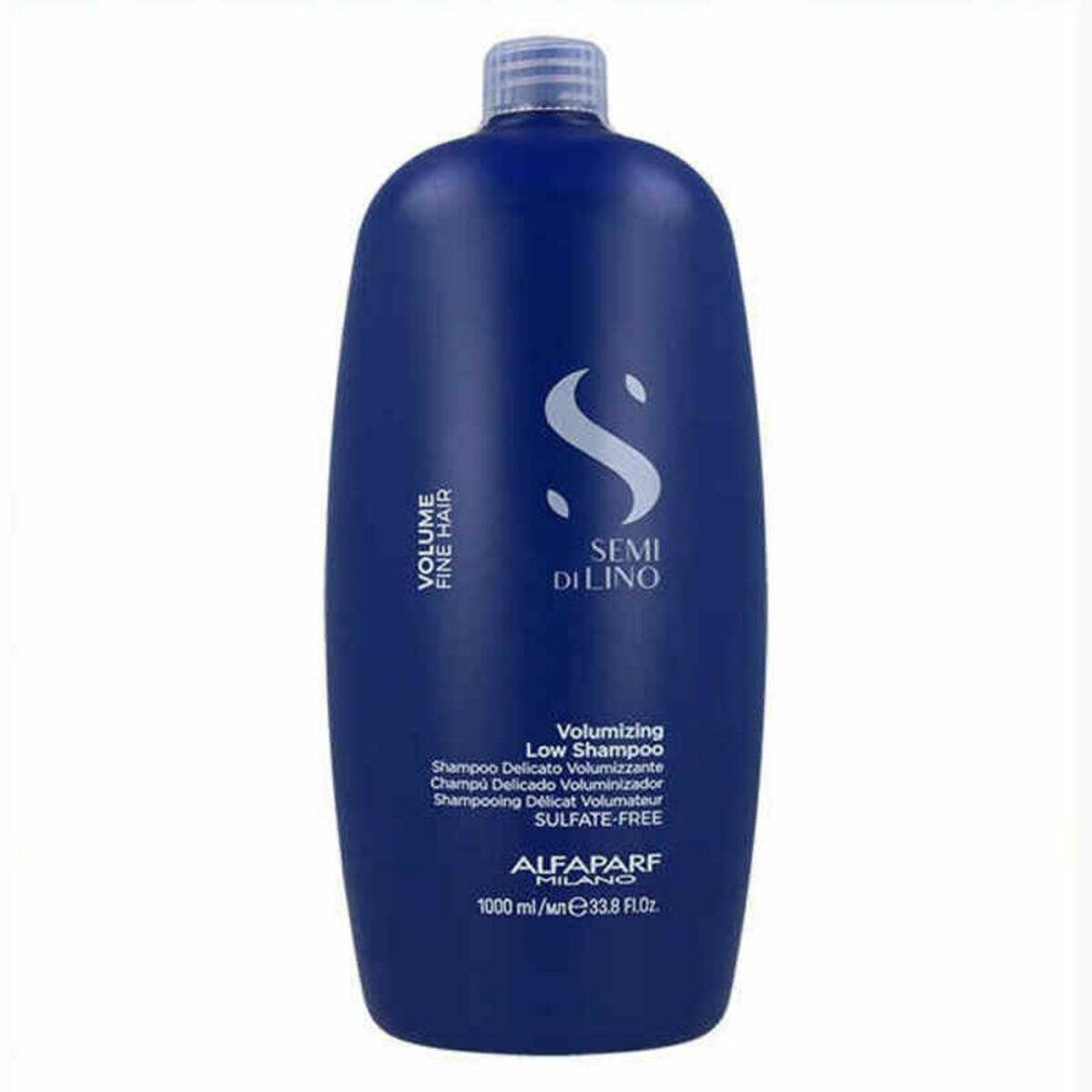 Blaue Shampoo-Flasche mit weißem Deckel. Text: Semi Di Lino, Volume Fine Hair, Volumizing Low Shampoo, Alfaparf Milano. 1000 ml.