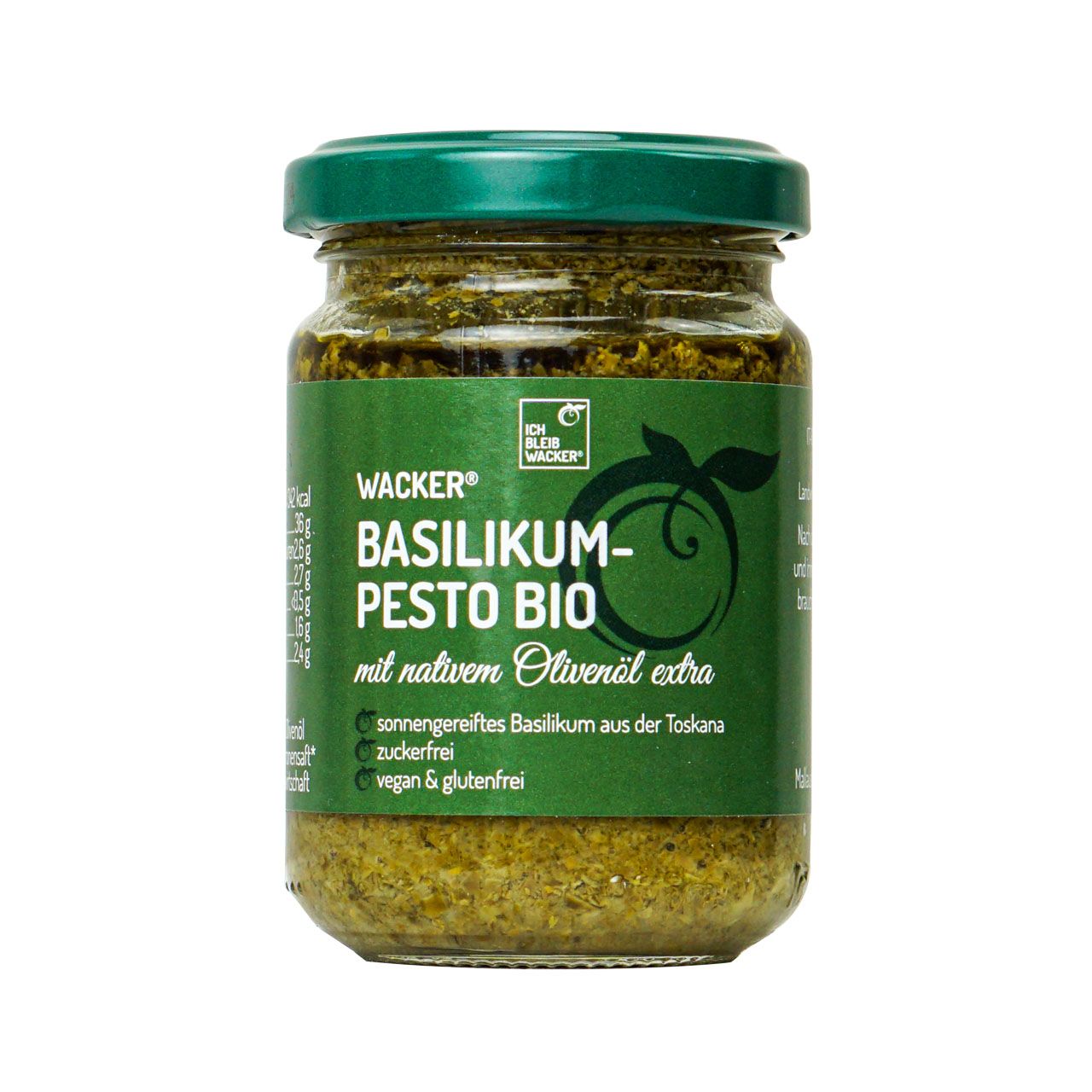Glas mit Wacker Basilikumpesto Bio. Grüner Inhalt, grüner Deckel. Beschriftung: Basilikumpesto Bio, mit nativem Olivenöl extra.