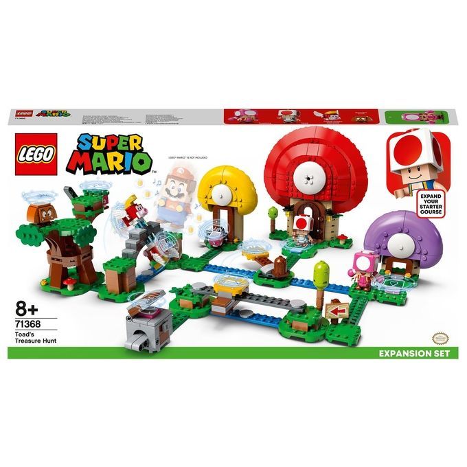 Set di espansione LEGO Super Mario "La Caccia al Tesoro di Toad". Il set mostra una scena con case a fungo, ponti e personaggi. La confezione mostra il logo LEGO, la scritta Super Mario e l'età consigliata 8+. È un pacchetto di espansione.