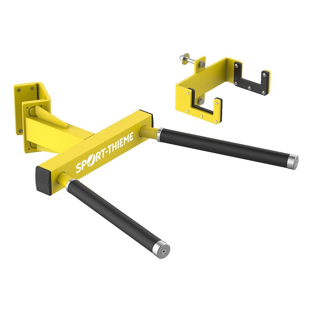 Gelbe Dipstange mit schwarzen Griffen und Halterung. Das Logo SPORT-THIEME ist sichtbar. Metallkonstruktion.