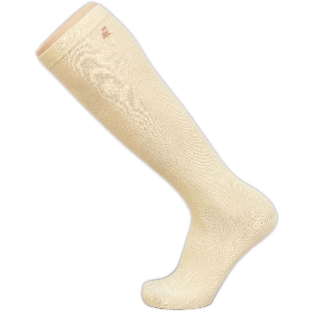 Beigefarbener Kniestrumpf. Angora-Material. Auf einem Fußmodell präsentiert. Logo am oberen Rand.