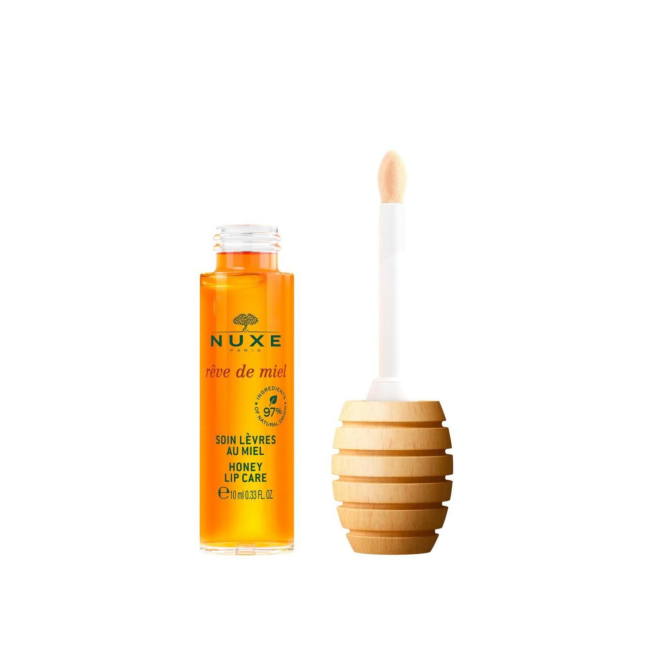 NUXE Rêve de Miel® Lippenpflegeöl. Flasche und Applikator. Aufschrift: Honey Lip Care.