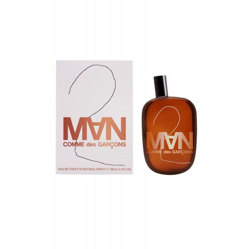 CDG 2 MAN Eau de Toilette Spray. Flakon und Verpackung. Braune Flüssigkeit, schwarzer Verschluss. Weißer Karton.