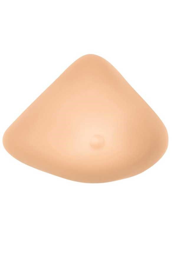 Brustprothese in mittlerer Form. Hautfarbenes, tropfenförmiges Silikon. Oberseite abgerundet, Unterseite flach.