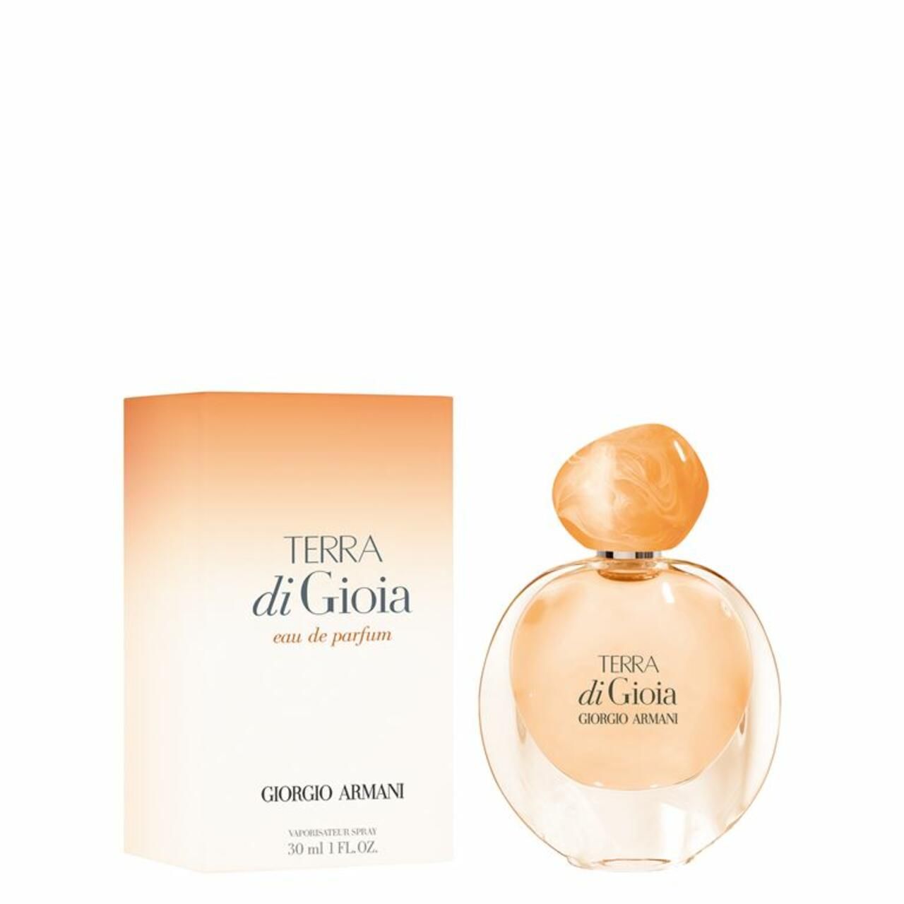 Terra di Gioia Flakon und Verpackung von Giorgio Armani. Flakon rund, orangefarben. Verpackung mit Schriftzug.