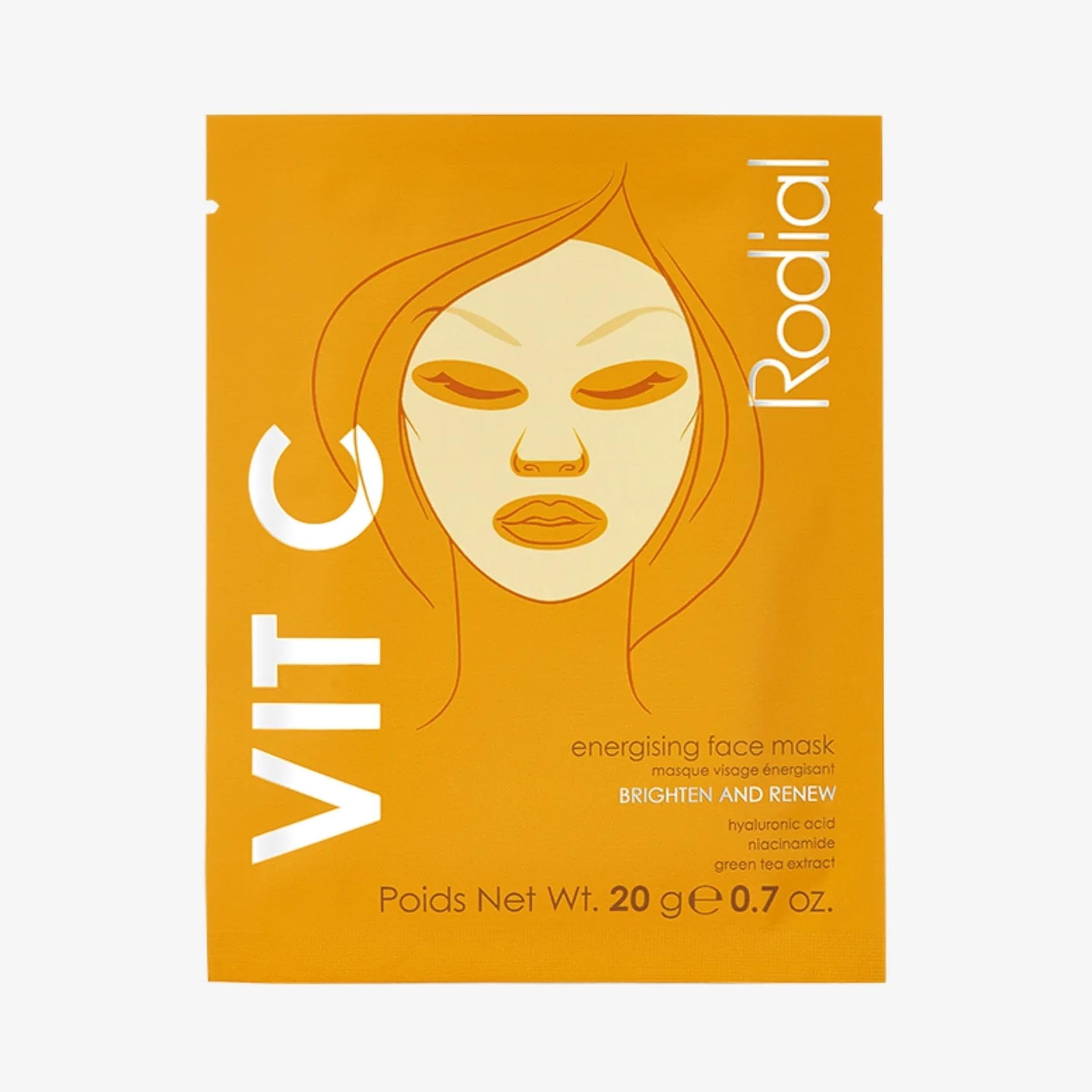 Orangefarbene Verpackung mit Gesichtsskizze und Schriftzug Vit C. Marke Rodial. Text: Energising Face Mask, Brighten and Renew.