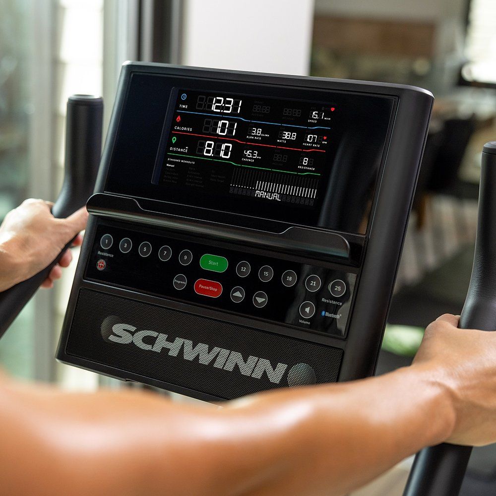 Fahrradtrainer-Konsole. Schwarzer Bildschirm mit Trainingsdaten. Schwinn-Logo. Knöpfe.