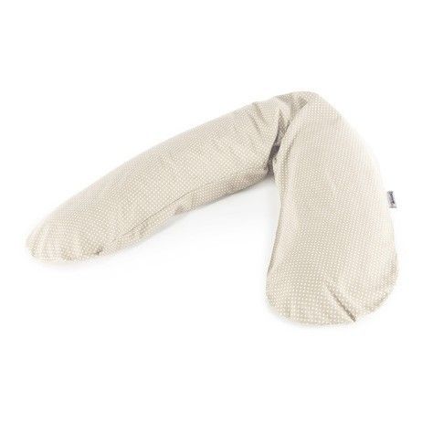 Beige Stillkissen mit weißen Punkten. L-förmig. Stoffbezug.