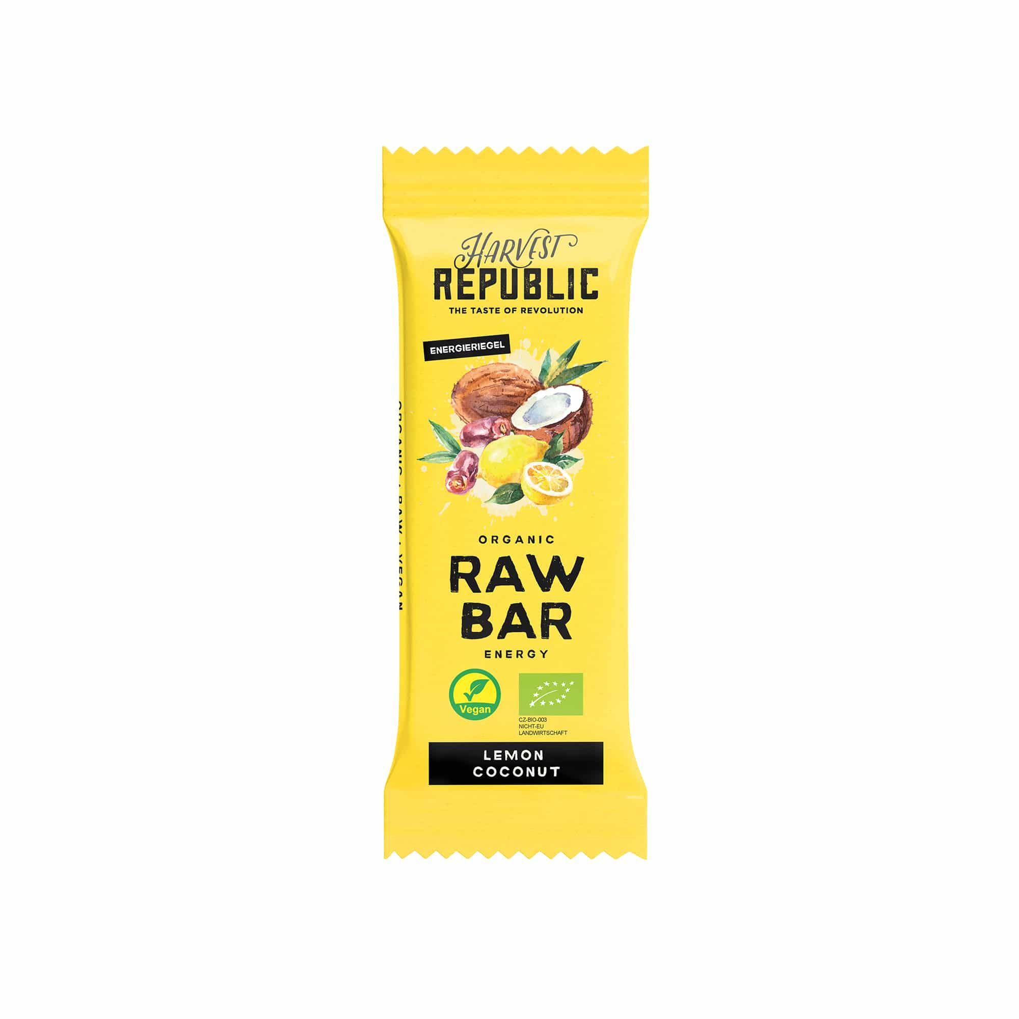 Gelber Riegel mit Aufdruck. Enthält Abbildungen von Zitrone, Kokosnuss und Früchten. Text: Harvest Republic, Raw Bar, Lemon Coconut.