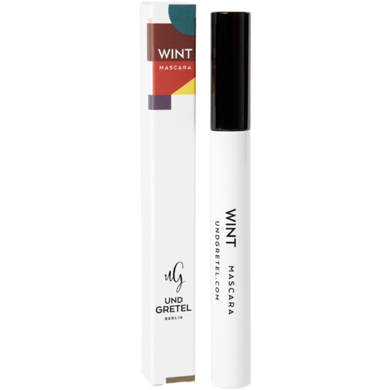 Weiße Mascarahülse und Verpackung. Aufschrift: WINT, UND GRETEL, MASCARA, UNDGRETEL.COM, BERLIN.