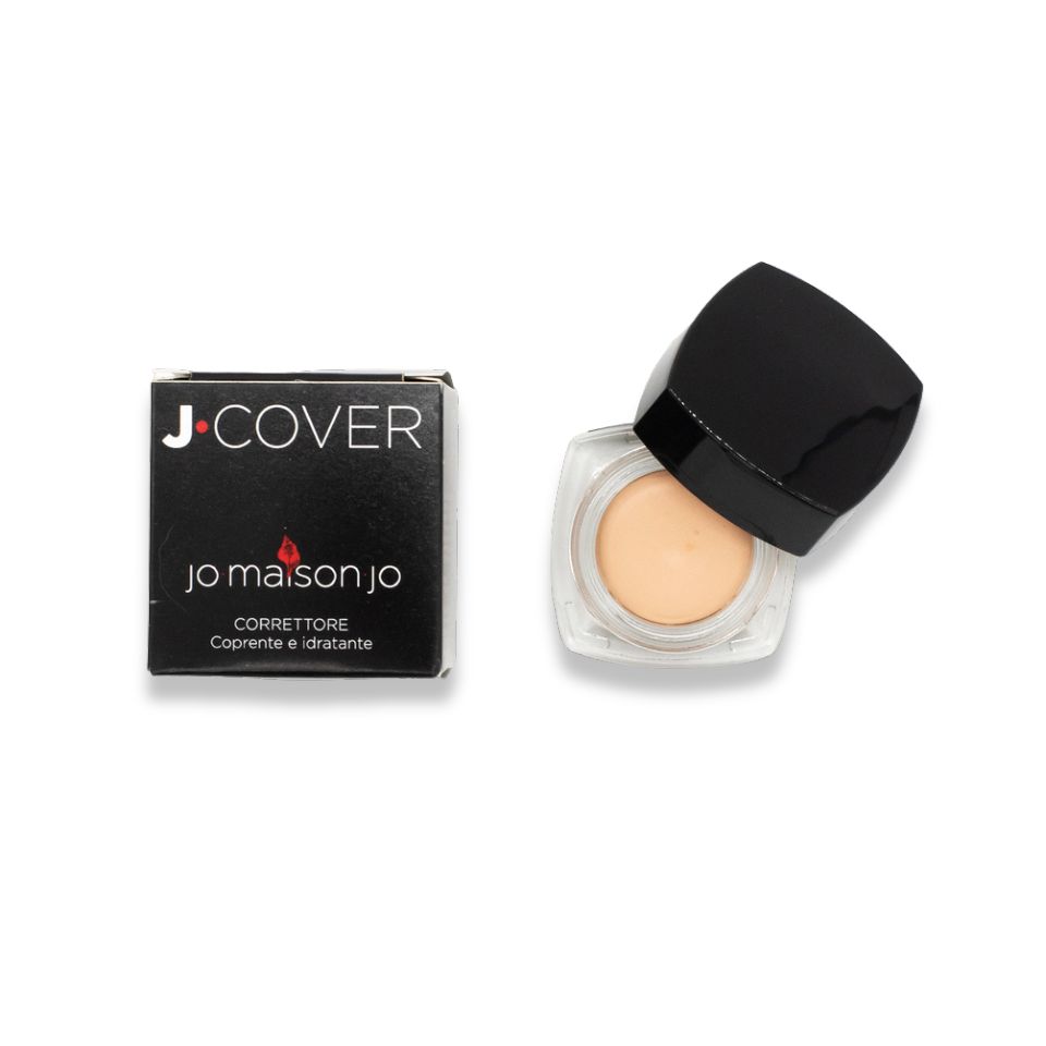 Confezione nera con logo e nome del prodotto. Accanto, contenitore rotondo aperto con contenuto beige e coperchio nero.